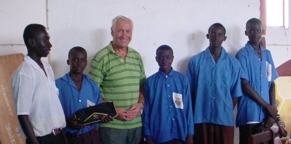 Ian with five boys who would have been excluded from school for non-payment of fees, but will now be able to complete their Grade 9 examinations