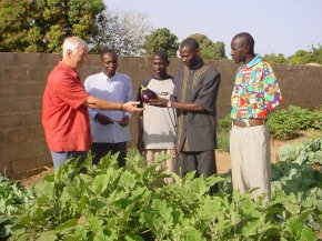 Ian is given an aubergine by the headmaster