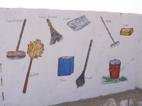 a painting of mops brushes and other tools for keeping the environment clean